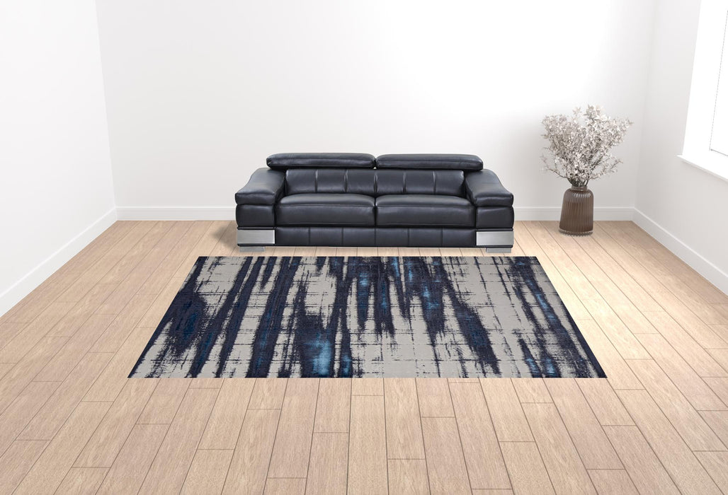 10' X 13' Ivory Blue And Gray Abstract Power Loom Distressed Area Rug