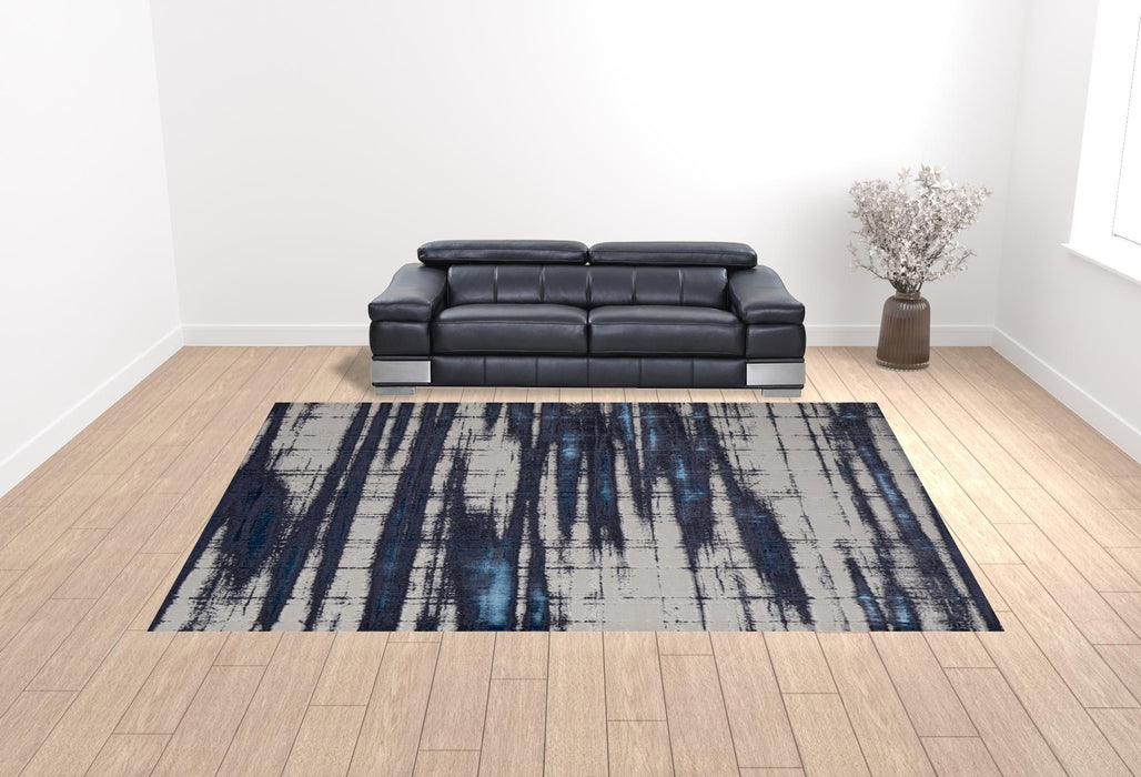 12' X 15' Ivory Blue And Gray Abstract Power Loom Distressed Area Rug