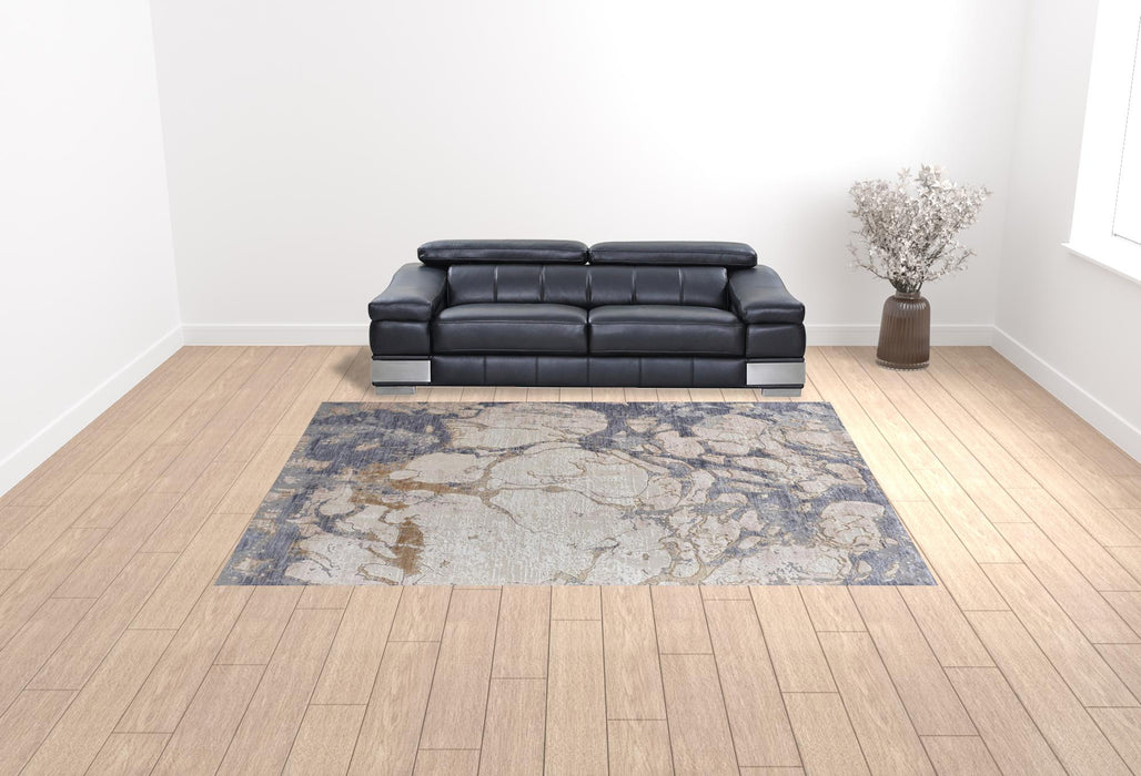 10' X 13' Tan And Blue Abstract Power Loom Distressed Area Rug